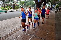 Joggers in the morning, Guangzhou, Guangdong, China November 2015.