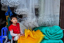 Fishing net and fish trap equipment shops, Xia Shan area in the Zhan Jiang city, Guangdong, China November 2015.