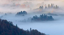 Mist in the valley from Voldnik&#39;s outlook, Koprivnik, Slovenia, October.