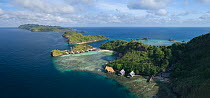 Misool Eco Resort and coral reef, aerial view. Raja Ampat Islands, West Papua, Indonesia. 2018.