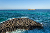 Columnar basalt rock at Fingal Head, extends underwater to Cook Island. New South Wales, Australia. 2018.