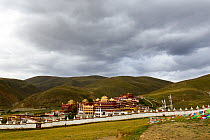 Ganden Thubchen Choekhorling Monastery surrounded by steppe. Litang, Garze Tibetan Autonomous Prefecture, Sichuan, China. October 2016.