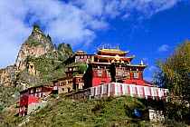 Palpung Monastery below mountain peak. Kham, Dege County, Garze Tibetan Autonomous Prefecture, Sichuan, China. 2016.