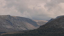 Clouds passing over mountains, Cairngorms National Park, Scotland.