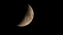 Waxing crescent moon, England.