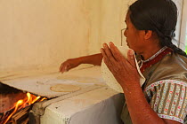 Woman making tortillas, Finca Nueva Linda, El Triunfo Biosphere Reserve, Chiapas, southern Mexico, April 2015