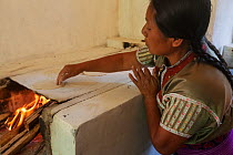 Woman making tortillas, Finca Nueva Linda, El Triunfo Biosphere Reserve, Chiapas, southern Mexico, April 2015