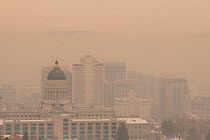 Air pollution over Salt Lake City during winter temperature inversion. Utah, USA. January 2019.