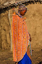 Maasai bride dressed for wedding ceremony. Maasai Mara National Reserve, Kenya. 2007.