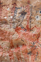 Pictographs depicting Deer / Antelope and Sheep alongside people with arms in air. Cueva La Pintada cave paintings, Sierra de San Francisco, El Vizcaino Biosphere Reserve, Baja California Sur, Mexico....