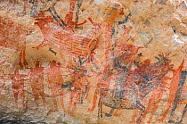 Pictographs depicting people with arms spread alongside Sheep and Deer / Antelope. Cueva La Pintada cave paintings, Sierra de San Francisco, El Vizcaino Biosphere Reserve, Baja California Sur, Mexico....