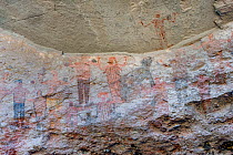 Pictographs depicting people with arms in air and animal, possibly a Coyote. Dating from 10,000 years ago. El Palmarito cave paintings, Sierra de San Francisco, El Vizcaino Biosphere Reserve, Baja Cal...