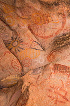 Rock art in cave, several circles and depiction of sun. Near Catavina, Valle de los Cirios Reserve, Northern Baja California, Mexico. 2008.