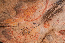 Rock art in cave, several circles and depiction of sun. Near Catavina, Valle de los Cirios Reserve, Northern Baja California, Mexico. 2008.