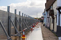 Flood defences holding back River Severn floodwaters along street in Bewdley. The river overtopped the barriers after Storm Ciara and Storm Dennis, the wettest February recorded in the UK. Worcestersh...