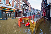 Shops in town centre flooded by River Severn. After Storm Ciara and Storm Dennis, the wettest February recorded in the UK. Shrewsbury, Shropshire, England, UK. February 2020.