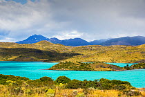 Lake Pehoe and mountains. Lake turquoise coloured due to glacial rock flour. Torres del Paine National Park, Patagonia, Chile. January 2020.