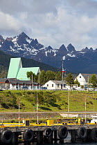 Puerto Williams, the most southerly town in the world, jetty in foreground and mountains in background. Navarino Island, Magallanes, Chile. January 2020.