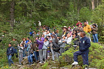 School children and rangers visiting the Monarch Butterfly Reserve at Sierra Chincua Sanctuary, Mexico.