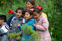 Children visiting the Monarch butterfly reserve at Sierra Chincua Sanctuary, Mexico.