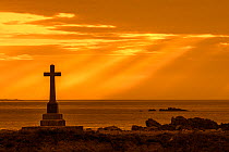Croix du Vendemiaire, stone cross monument in honor of the French Vendemiaire submarine crew, Goury, Cap de La Hague, Cotentin, Normandy, France. August 2020