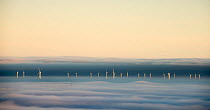 Hoyle Bank Windfarm in fog, with a flock of migrating birds, viewed from near Holywell, Flintsire, Wales, December. Winner of  Changing Landscapes category of Landscape Photographer of the Year compet...