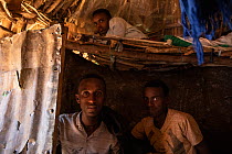 Church students inside hut at Saint Michael Orthodox Church. Bahir Dar, Ethiopia. 2018.