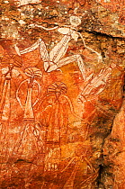 Aboriginal rock art depicting people and fish. Nourlangie, Kakadu National Park, Northern Territory, Australia.
