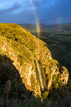 Rainbow over Paramo ecosystem - with Antisanilla reserve, Antisana Volcano, Ecuador.
