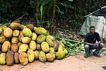 Local man with jackfruit, Moramanga, Eastern Madagascar. October 2018.