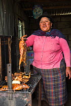 Cui or Guinea pig cooked for food, Chimborazo Province, Andes, Ecuador. November 2017.
