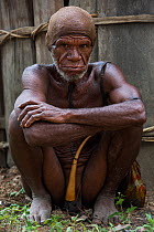 Dani tribe man with penis gourd / koteka. Budaya village, Suroba, Trikora Mountains, West Papua, Indonesia. October 2020.