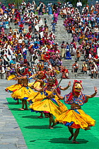 Dancers at Thimphu Tsechu Festival. Cham, or Masked dance. Bhutan. September 2013.