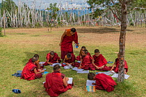 Young Monks in class. Chime Lhakhang Temple (The &#39;fertility temple&#39;) Bhutan. September 2013.