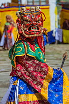 Dance of terrifying deities. Haa Tsechu festival at the &#39;white chapel&#39;. Cham, or Masked dancer, Bhutan. September 2013.