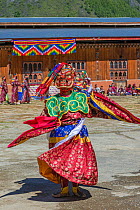 Dance of terrifying deities. Haa Tsechu festival at the &#39;white chapel&#39;. Cham, or Masked dancer. Bhutan. September 2013.
