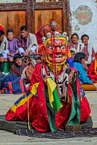 Cham or &#39;Mask&#39; Dancer at Gante Goemba Tsechu, festival in monastery courtyard. Phobjika, Bhutan. September 2013.