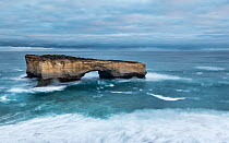 London Arch, formerly London Bridge, an offshore natural limestone arch formation, Port Campbell National Park, Victoria, Australia.   June, 2015