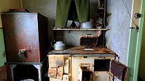 Panning shot of kitchen as it left after researchers evacuated in 1959. Station W, a former British scientific research station. Detaille Island, Graham Land, Antarctica, 2020.