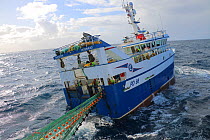 Fishing vessel Harvester&#39; retriving net while fishing at sea area Rockall. April 2020. Property released.