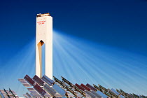 The PS20 solar thermal tower - part of the Solucar solar complex owned by Abengoa energy, in Sanlucar La Mayor, Andalucia, Spain. The site has solar tower, parabolic trough and photovoltaic solar tech...