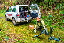 Ranger working on the disinfecting boots for biological safety of Montseny brook newt (Calotriton arnoldi),Montseny Natural Park, Barcelona, Catalonia, Spain. Critically endangered species, first desc...