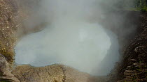 Tilt up shot of Boiling Lake, the second largest of its kind in the world, Dominica, West Indies, 2020.