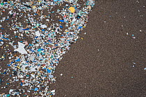 Plastic and microplastics covering the beaches, brought in by the winds and the tides, Canary Islands.