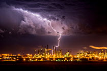 Lightning strike over South Africa&#39;s largest coal processing plant. Sasol, Mpumalanga, South Africa, November, 2016.