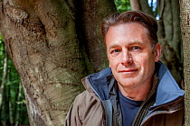 Naturalist and presenter Chris Packham during filming of the BBC programme &#39;Animals Guide to Britain&#39;, Epping Forest, UK. 2010.