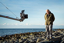 Sir David Attenborough during filming of the BBC progamme &#39;Attenborough and the Sea Dragon&#39;. Lyme Regis, Dorset, UK. 2016. EDITORIAL USE ONLY.