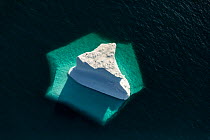 Iceberg showing submerged section when viewed from above, Greenland's National Park, Northeast Greenland. August 2015.