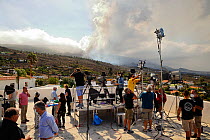 Television crews broadcasting the Cumbre Vieja volcano eruption from El Paso, La Palma, Canary Islands, September 2021.