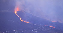 Lava flow from volcanic eruption reaching buildings, Cumbre Vieja Volcano, La Palma, Canary Islands, September 2021.